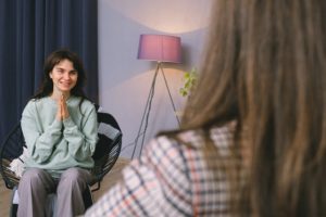 white woman speaking to therapist