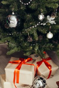 close up of Christmas tree with presents