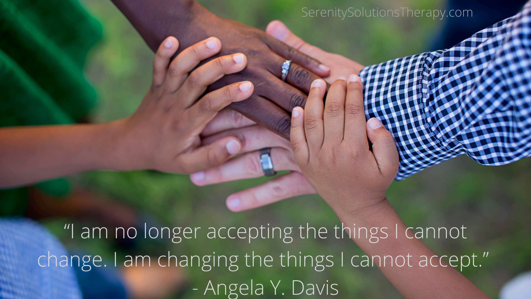 multiracial hands connected with a quote underneath