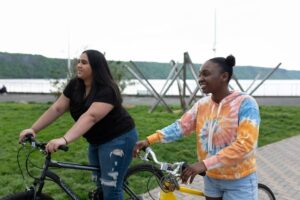 two young women biking