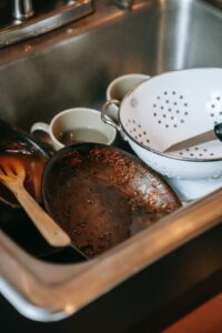 anger management therapy-sink full of dirty dishes